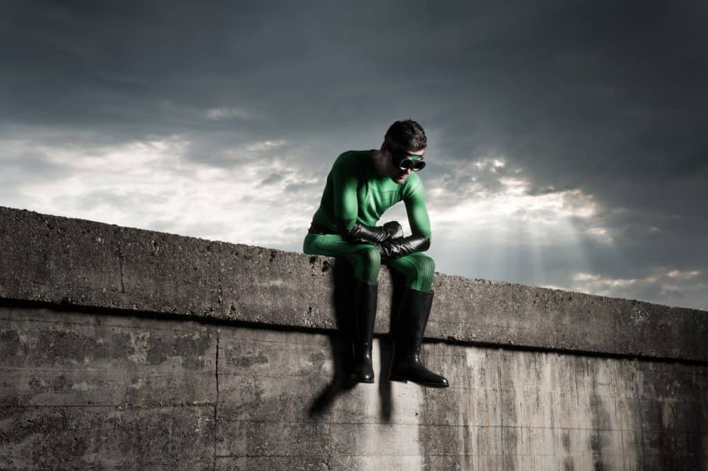 Superhero with dramatic sky on background